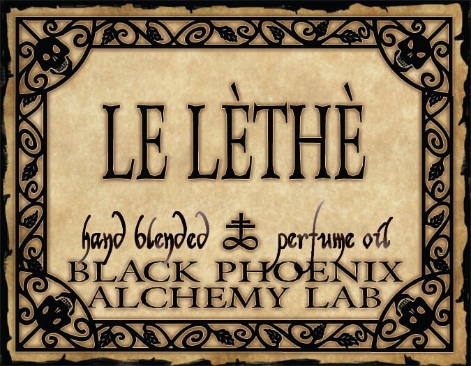 Label for 'Le Lèthe' hand blended perfume oil by Black Phoenix Alchemy Lab with decorative border.