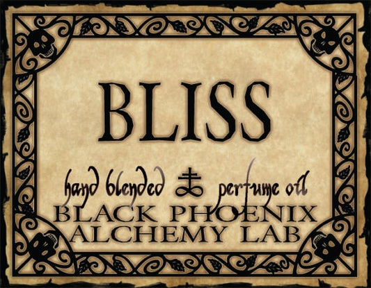 Label for 'Bliss' hand blended perfume oil by Black Phoenix Alchemy Lab with decorative border.