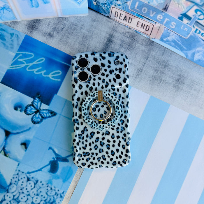 Trendy light blue wavy iPhone case featuring a high-contrast leopard print in dark blue and sapphire with a high-gloss finish.