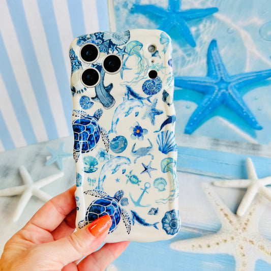 Blue Lagoon nautical watercolor MagSafe phone grip ring with sea turtles, whales, and jellyfish in shades of blue on a white background compatible with iPhone and Samsung