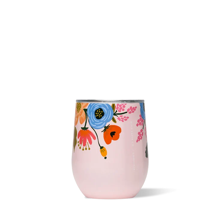 A pink stemless cup with a lively floral pattern