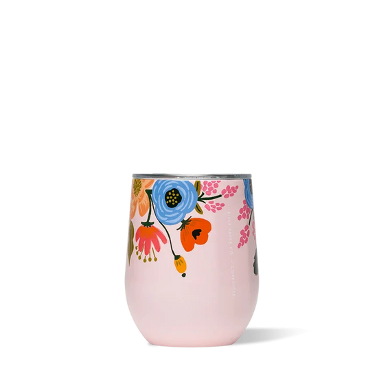 A pink stemless cup with a lively floral pattern