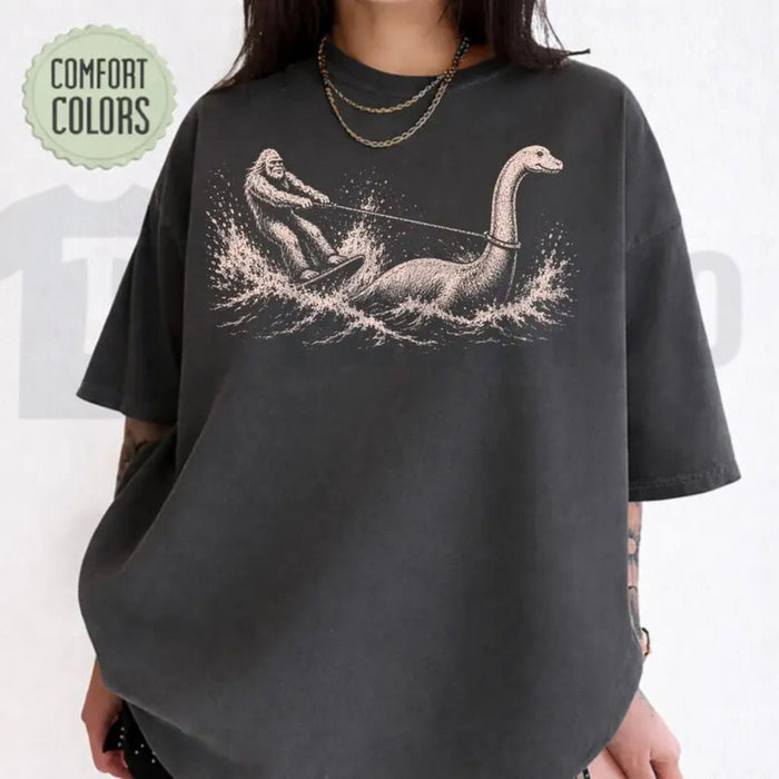 Funny Bigfoot Loch Ness Waterskiing Comfort Colors Shirt – Retro Cryptid Tee