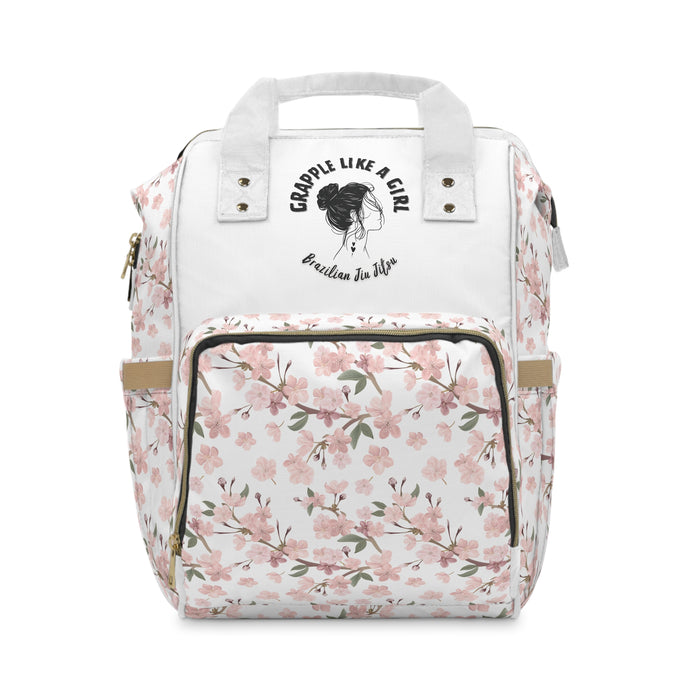 Floral-patterned backpack with a white top section and brand logo on a white background