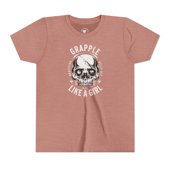 Pink t-shirt with skull graphic and text on a white background