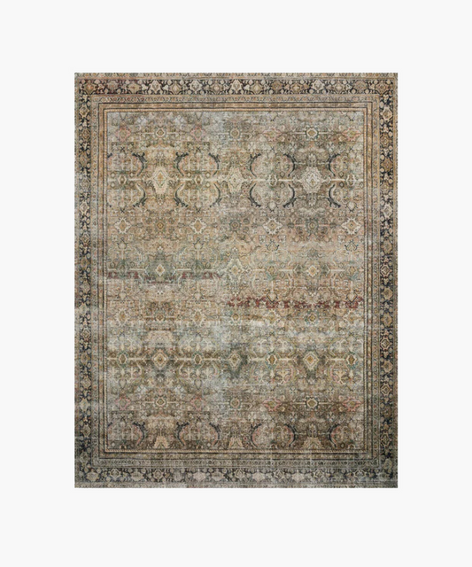An antique-style rug with intricate floral and geometric patterns in muted earth tones, surrounded by a decorative border, creating an elegant vintage look. | SW Home