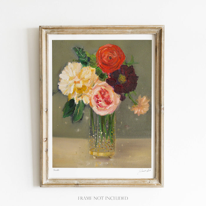 Framed artwork of a bouquet of flowers with a gold frame on a white background