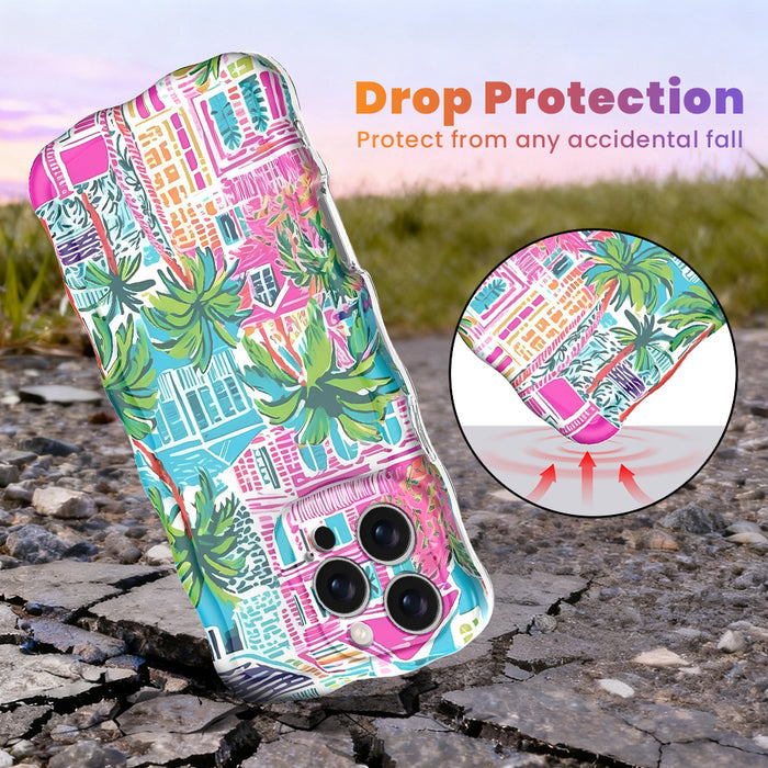 Trendy wavy iPhone case featuring a vibrant tropical resort scene with pink villas and green palm trees with a high-gloss finish.