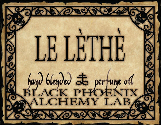 Label for 'Le Lèthe' hand blended perfume oil by Black Phoenix Alchemy Lab with decorative border.