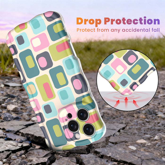 Trendy wavy iPhone case featuring a teal, pink, and lime green Mid-Century Modern geometric pattern with a high-gloss finish.