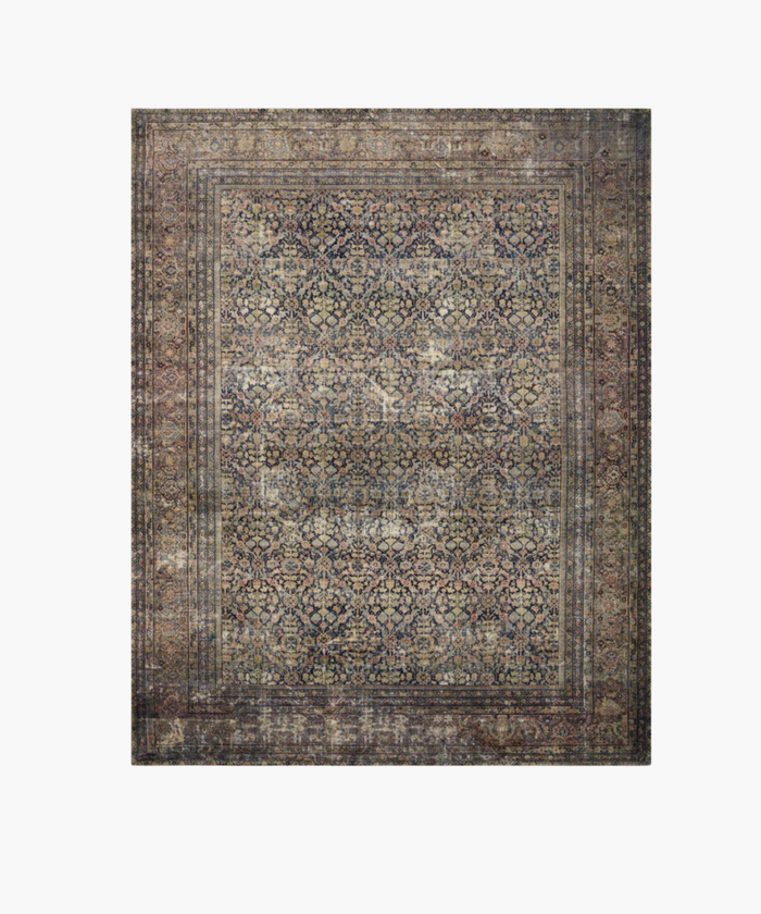 A vintage inspired rug with intricate floral and geometric patterns in muted blues, reds, and browns. It exudes a sense of classic elegance and warmth. | SW Home