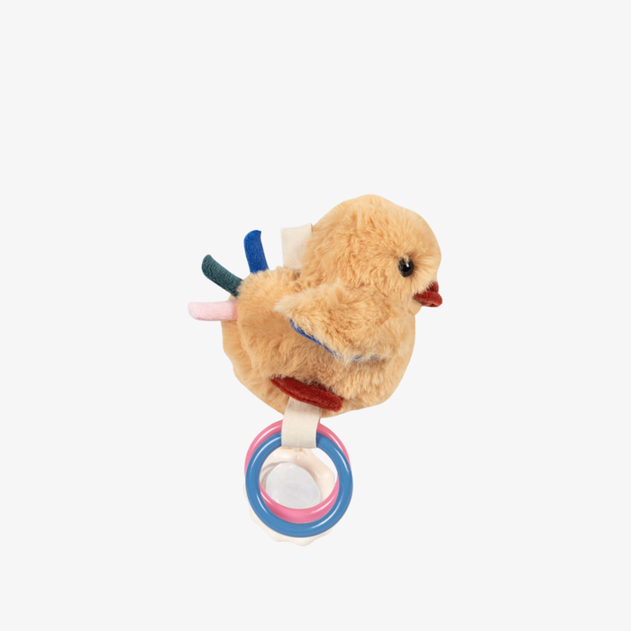 Plush toy with rattle on a white background