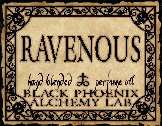 Label for 'Ravenous' hand blended perfume oil by Black Phoenix Alchemy Lab with decorative border.