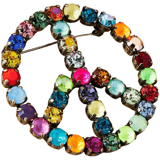 Multicolored jeweled peace sign brooch on a white background