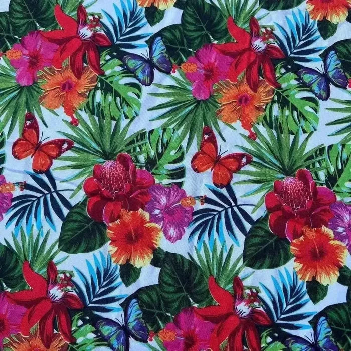 White tablecloth with tropical flower design on dining table