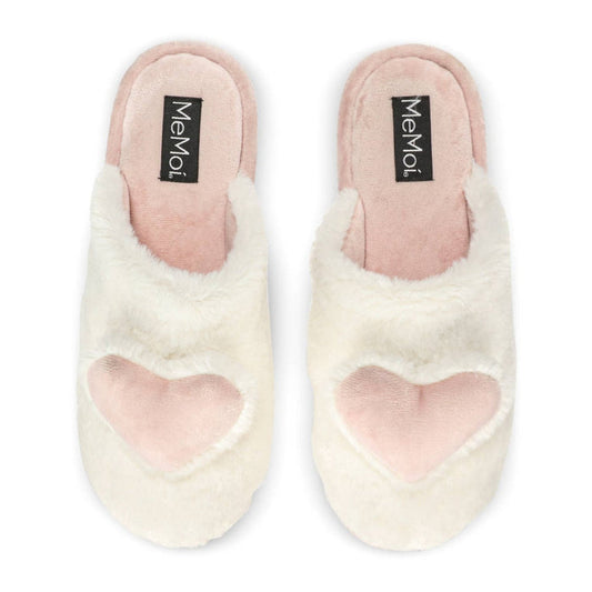 Pair of white fuzzy slippers with pink hearts and 'Memo' label on a white background