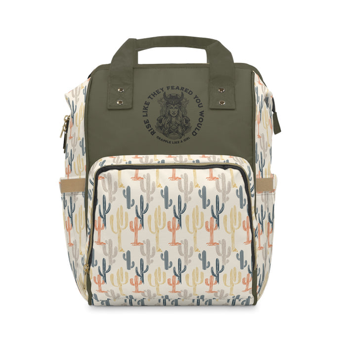 Backpack with cactus pattern and green top section on a white background