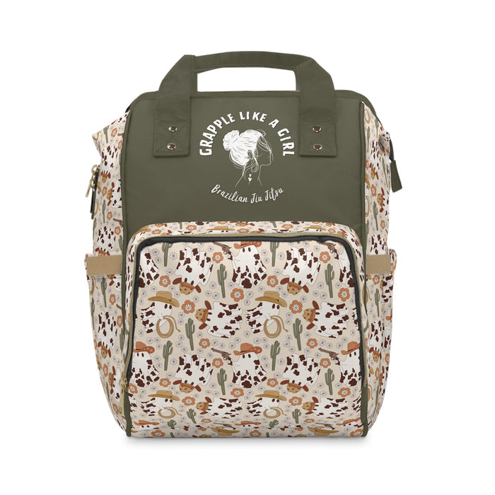 Backpack with a green top section and patterned bottom section on a white background